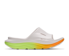 White sandal with a colorful sole on a white background