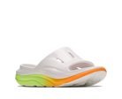 White sandal with a colorful sole on a white background