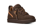 A brown low-top lace-up shoe with a fuzzy brown collar, brown textured overlays, and a thick brown sole, shown on a plain white background.
