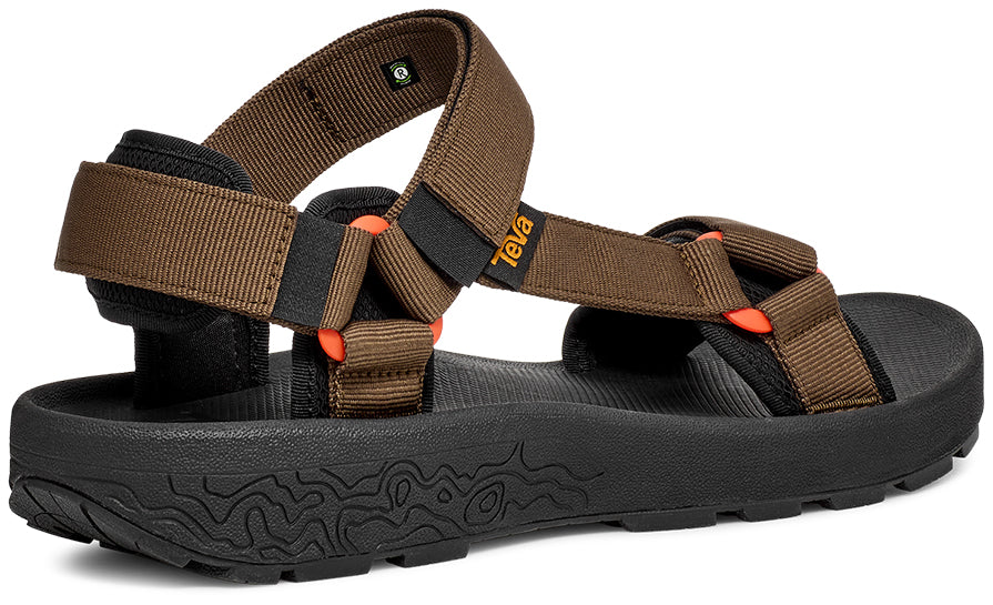 Brown sandal with black sole on a white background