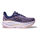 Purple running shoe with white sole on a white background
