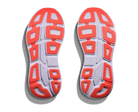 Close-up of a pair of running shoes with red and white sole pattern on a white background