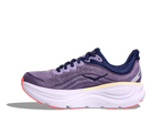 Purple running shoe with white sole on a white background