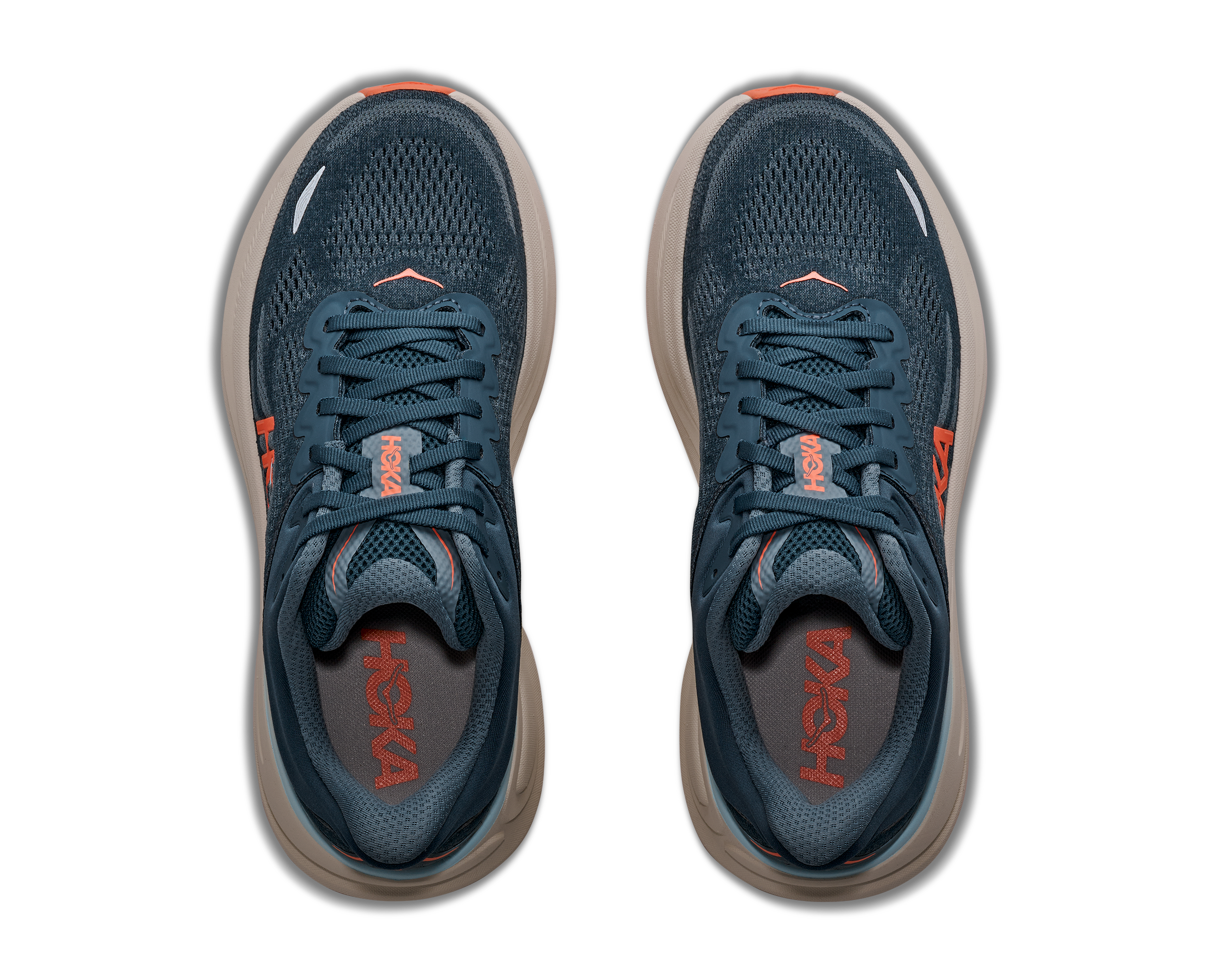 Pair of blue running shoes with orange accents on a transparent background