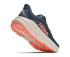 Navy running shoe with orange sole on a white background