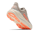 Hoka running shoe with orange sole on a white background