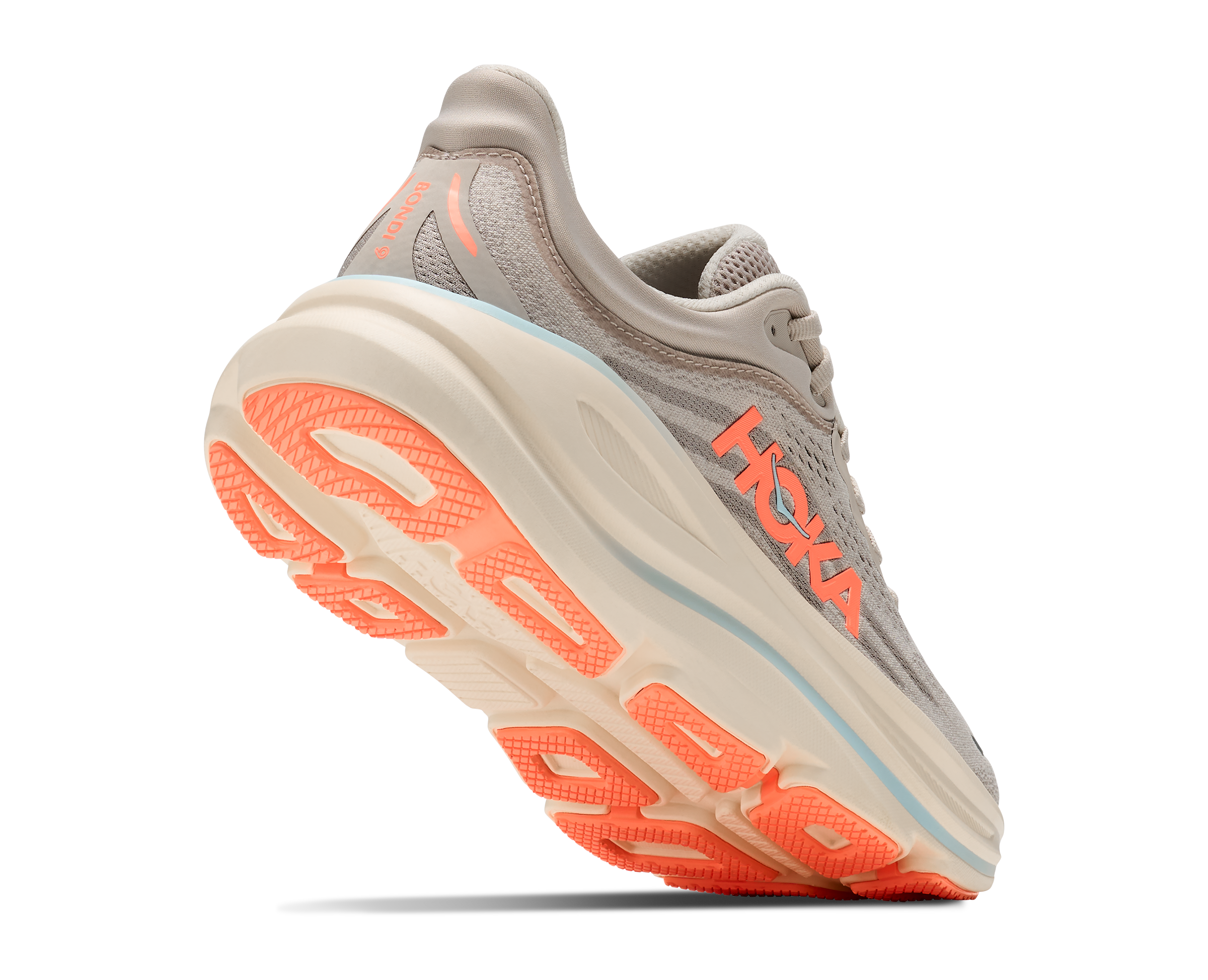 Hoka running shoe with orange sole on a white background