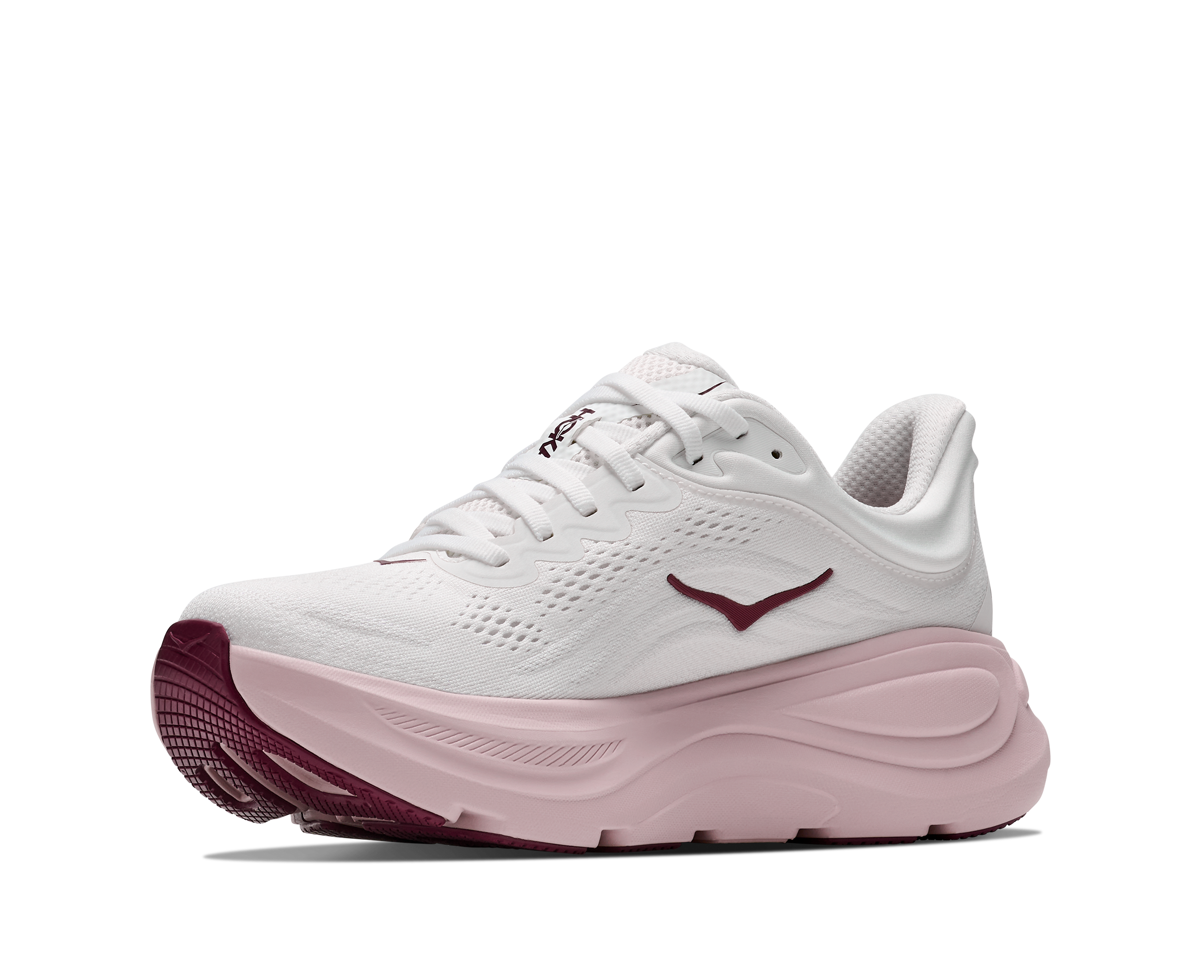 White running shoe with pink sole on a white background