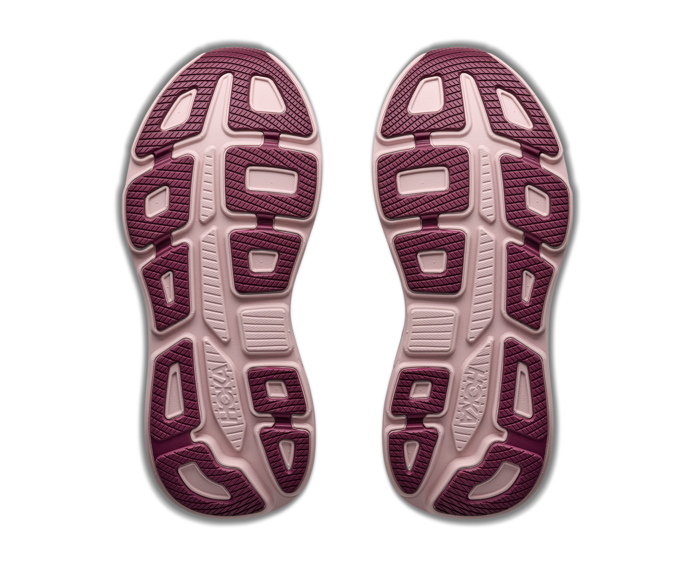 Close-up of the sole of a running shoe with brand logo on a white background