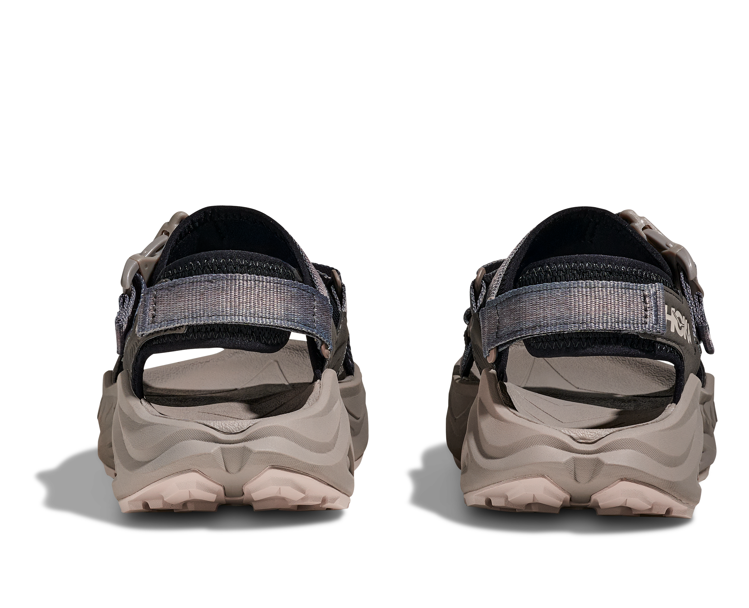 Pair of hiking sandals with visible brand logo on a white background