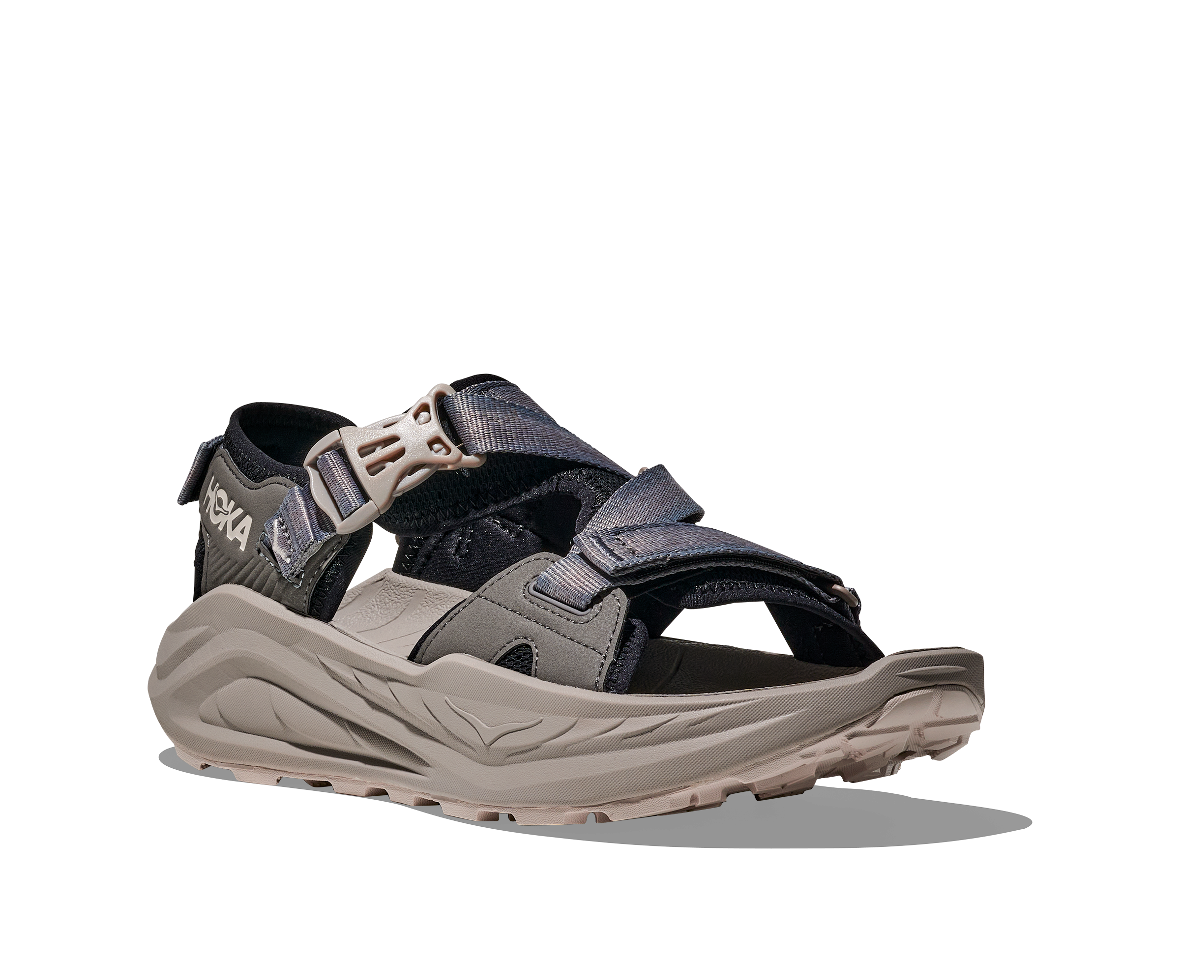 Black and beige sandal with a visible brand logo on a white background