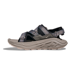 Gray sandal with multiple straps on a white background