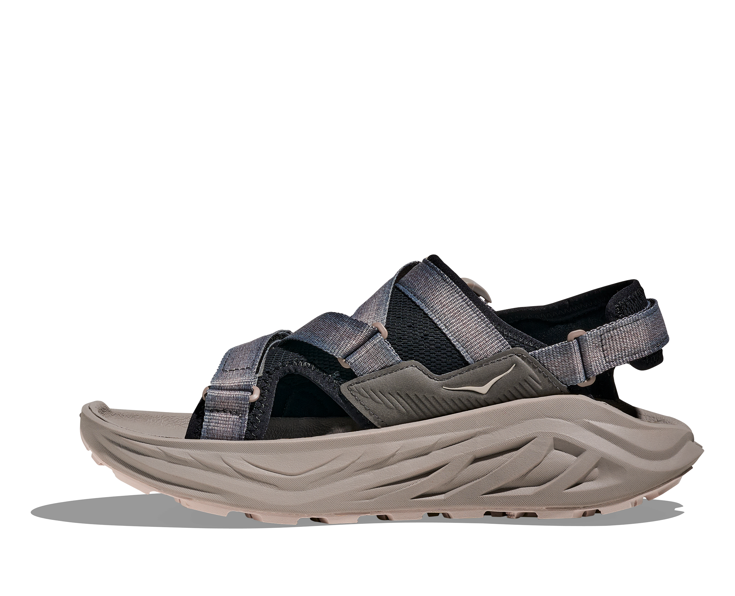 Gray sandal with multiple straps on a white background