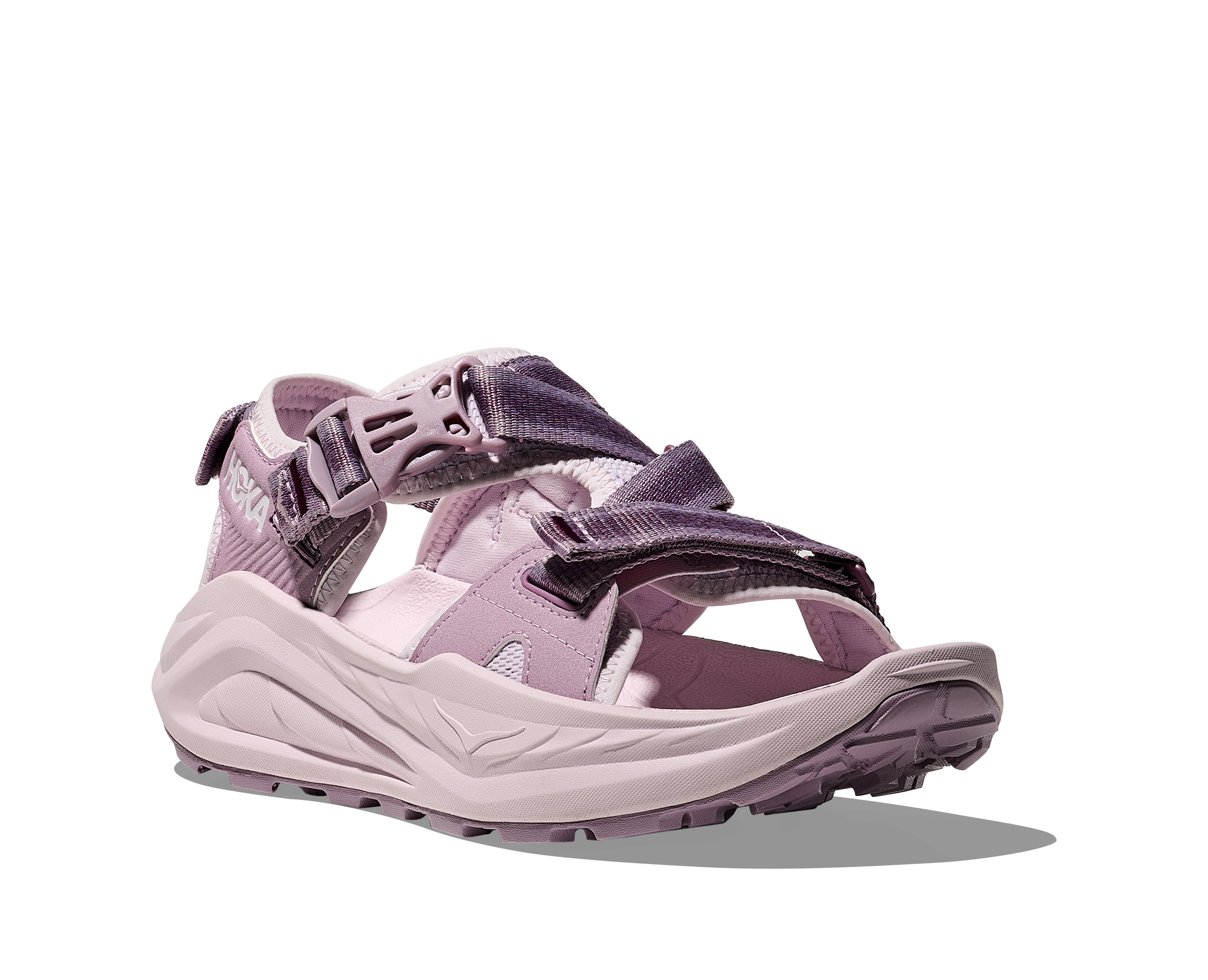 Purple sandal with a white sole on a white background