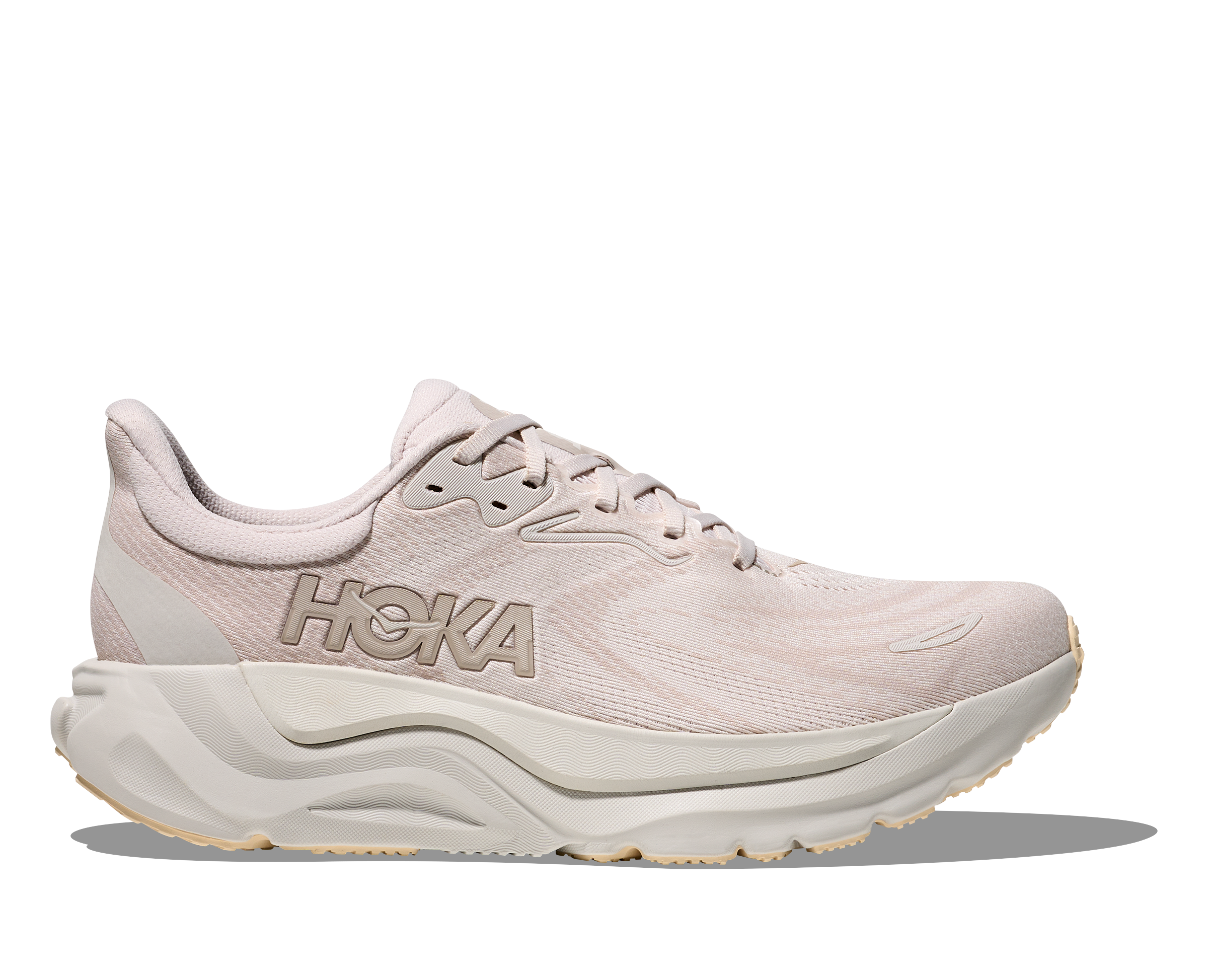 Pink running shoe with 'Hoka' branding on a white background