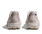 Pair of light pink sneakers shown from the back on a white background