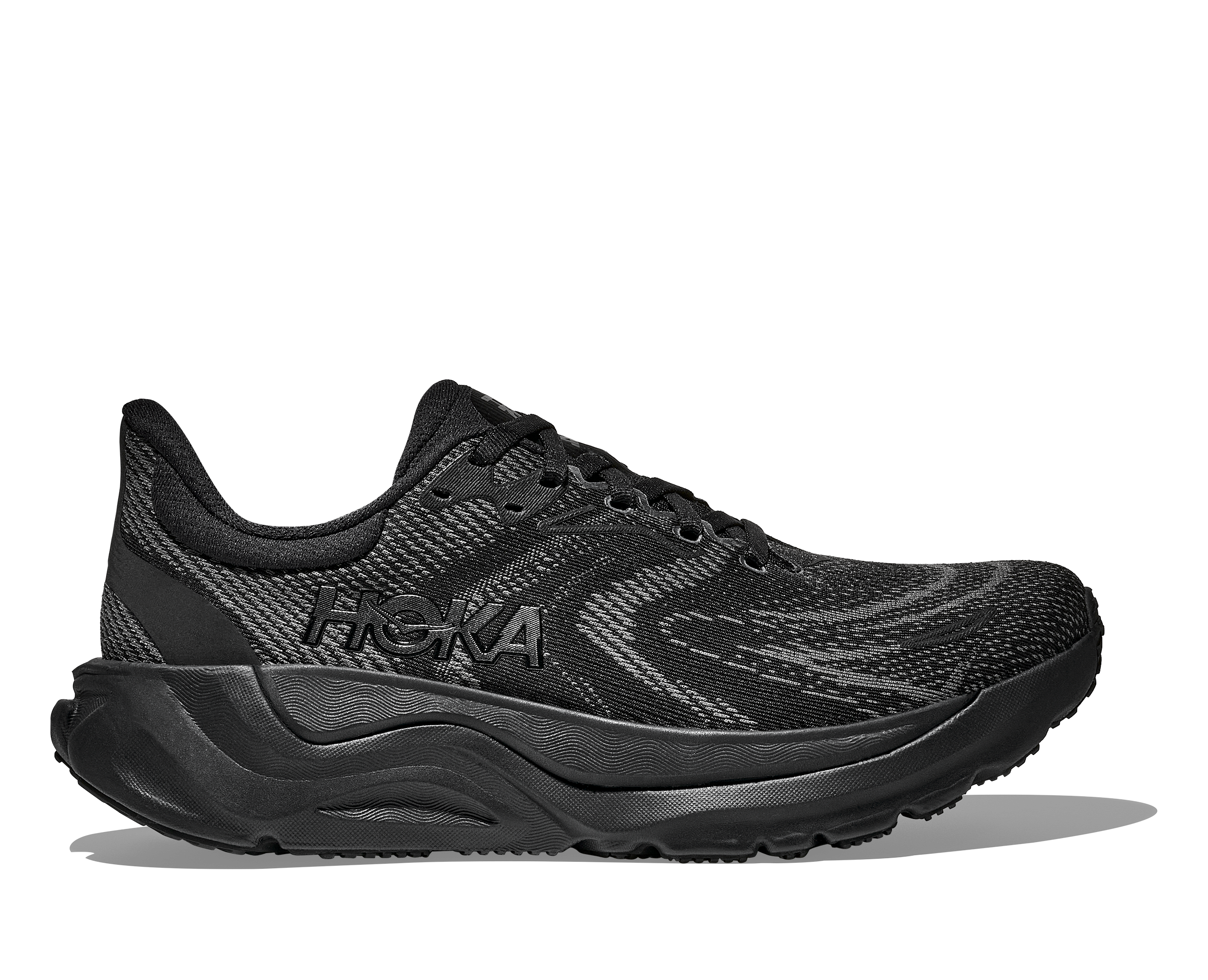 Black running shoe with 'Hoka' branding on a white background