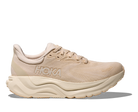 Beige running shoe with 'Hoka' branding on a white background