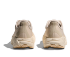 Beige sneakers shown from the back on a white background