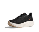Black running shoe with a white sole on a white background