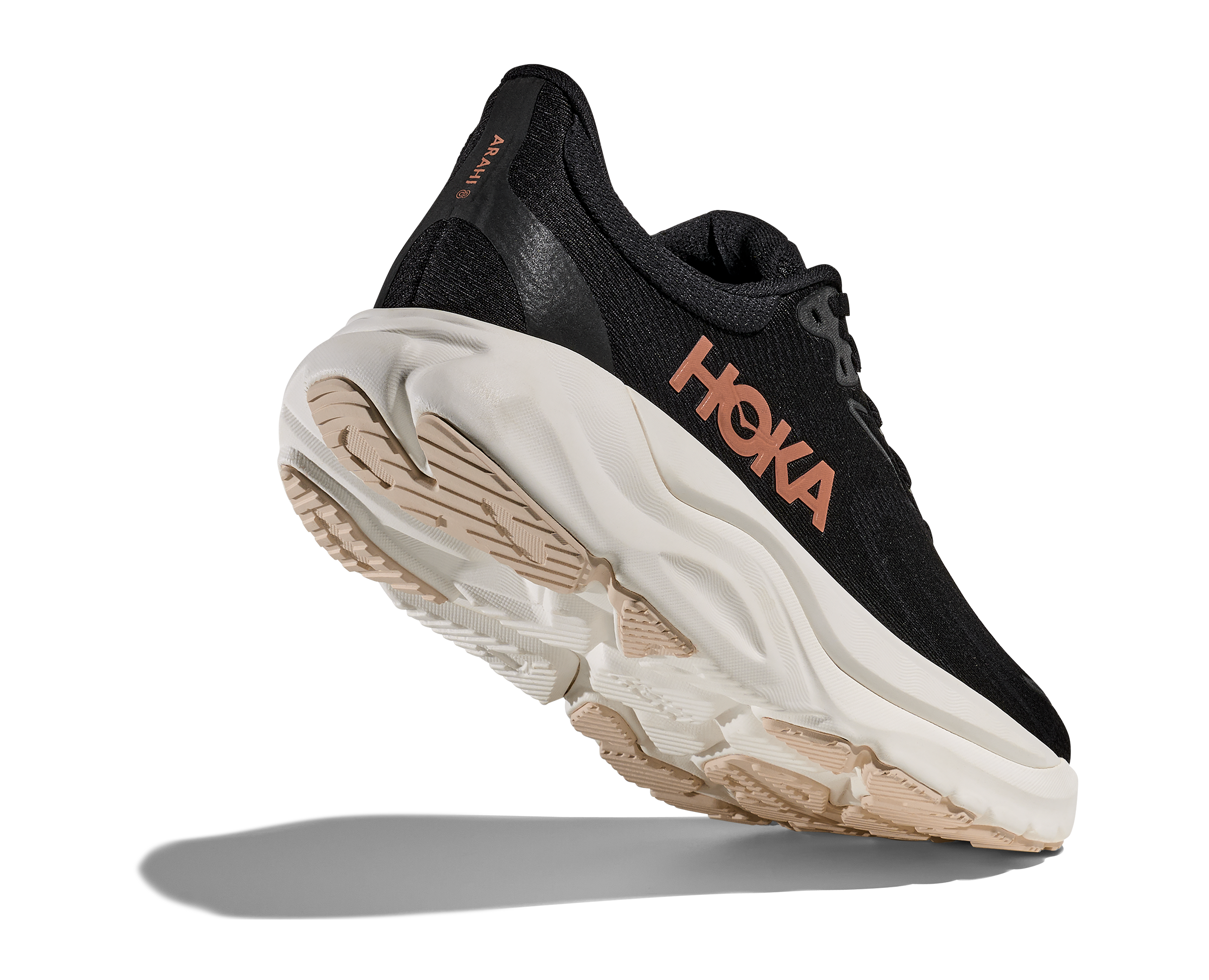 Black running shoe with white sole and 'Hoka' branding on a white background