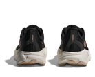 Black running shoes with white soles on a white background