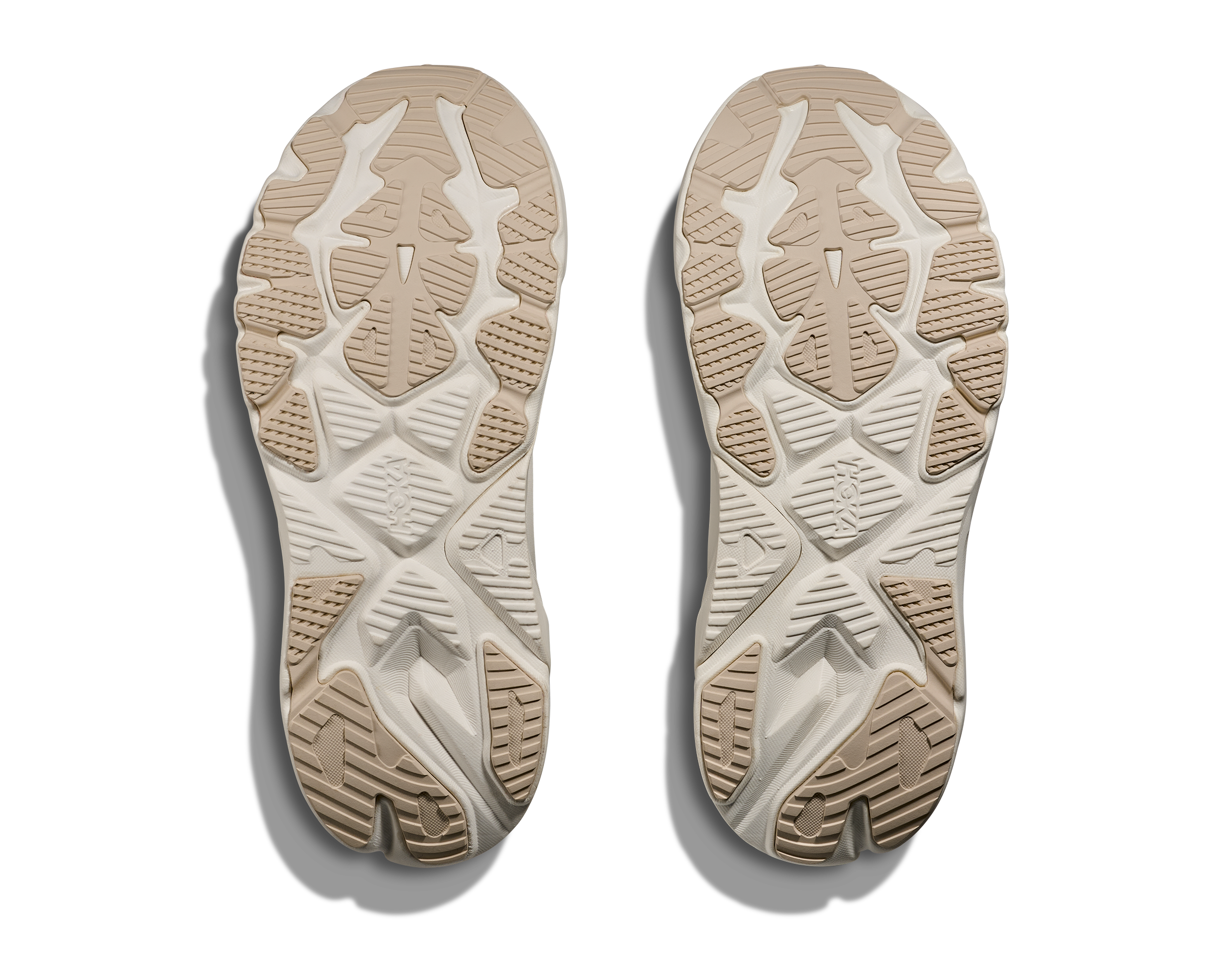 Close-up of the sole of a shoe with a textured pattern on a white background