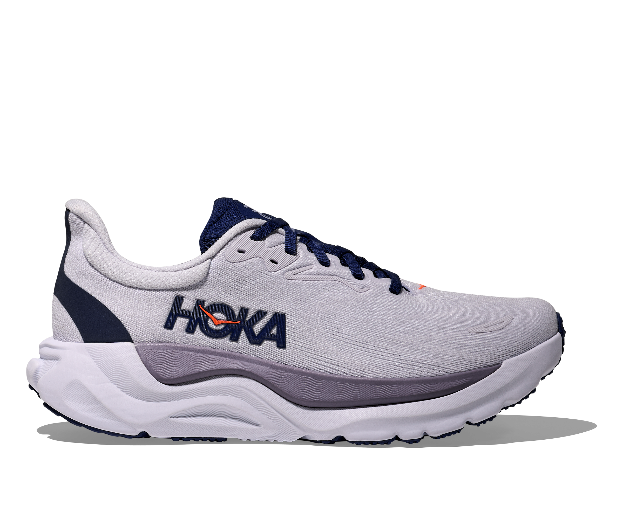 White running shoe with blue accents on a white background