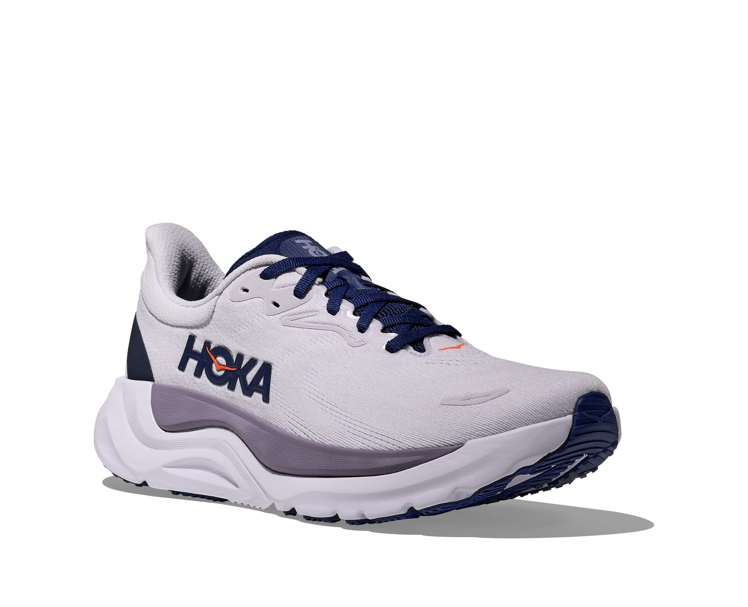 White running shoe with blue accents on a white background