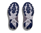 Close-up of a pair of running shoes with a focus on the sole design.