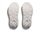 White shoe soles with tread pattern on a white background