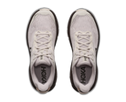 Pair of light gray running shoes with black soles on a white background