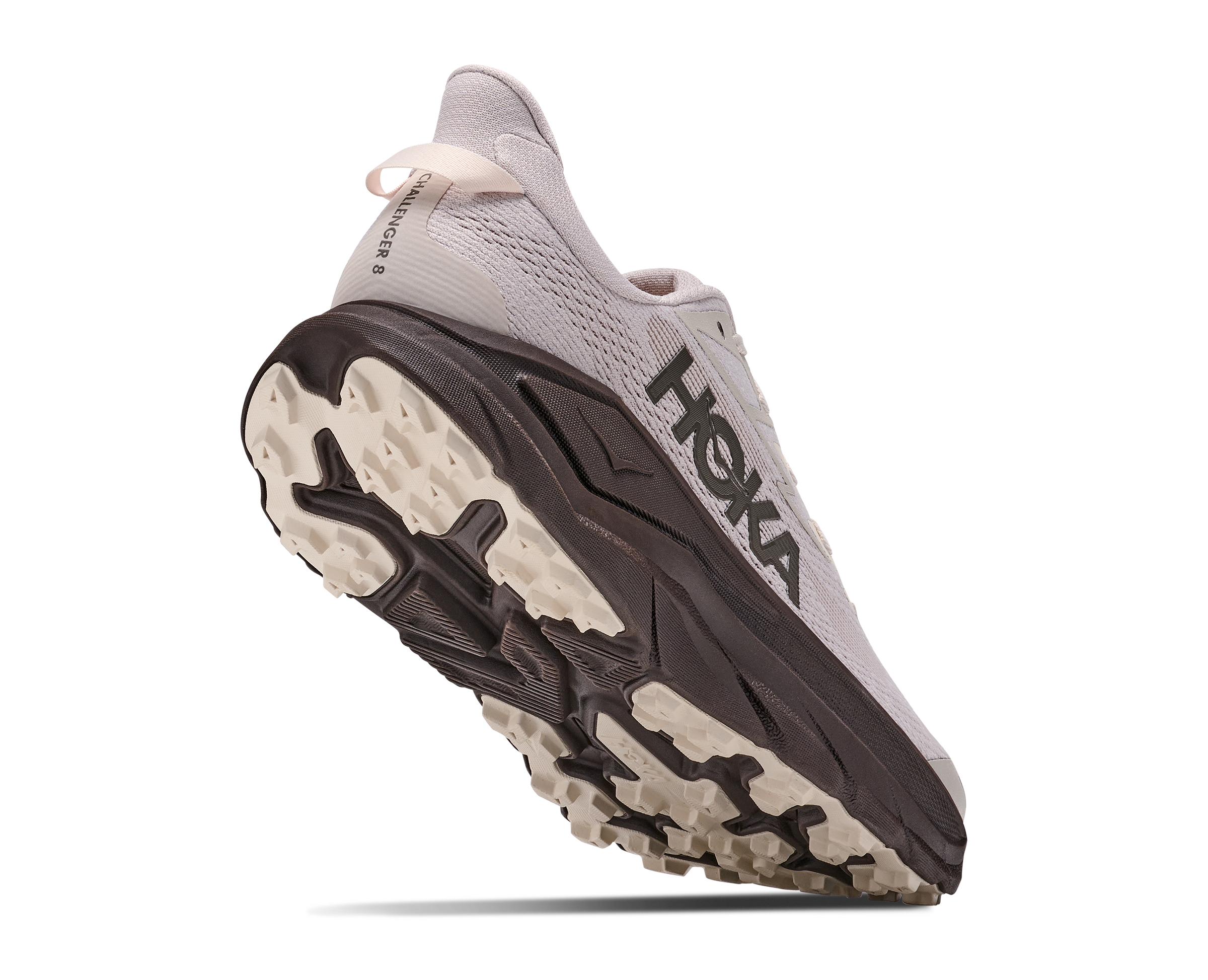 Hoka running shoe with sole facing up on a white background
