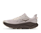 White running shoe with a brown sole on a white background