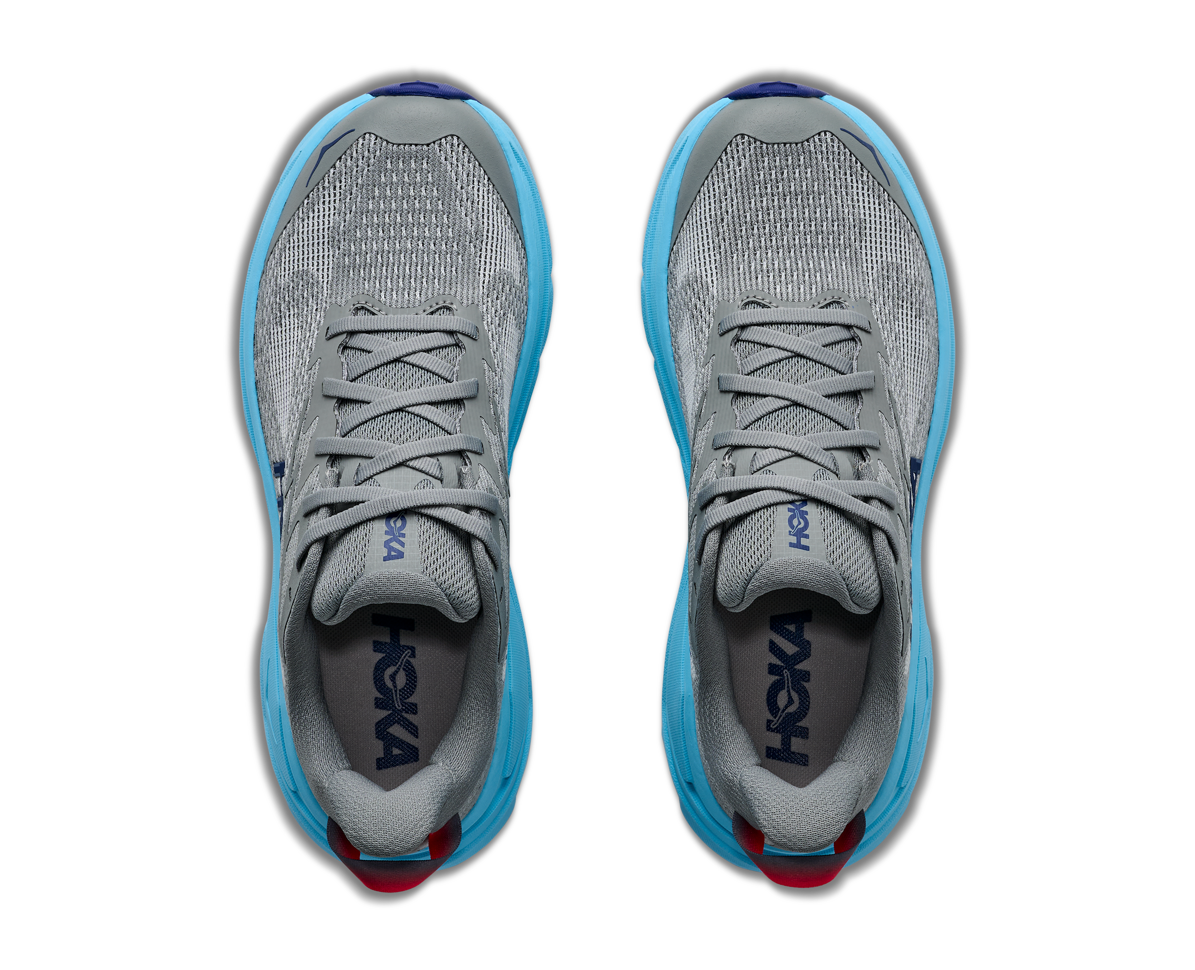 Gray and blue running shoes with 'Hoka' branding on a white background