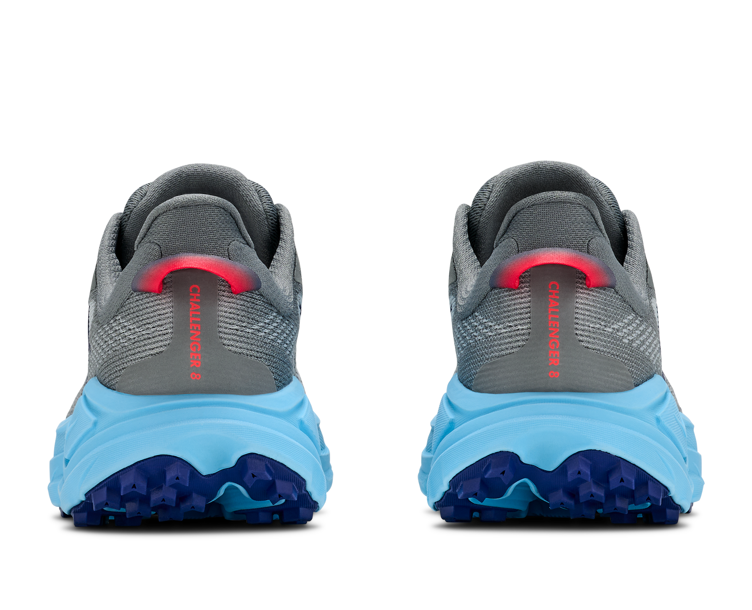 Gray and blue running shoes with red accents on a white background