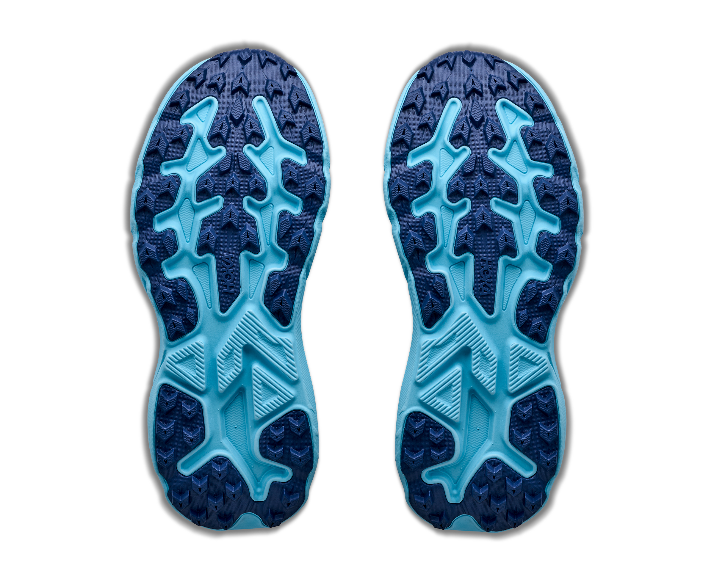 Blue shoe sole with textured pattern on a white background