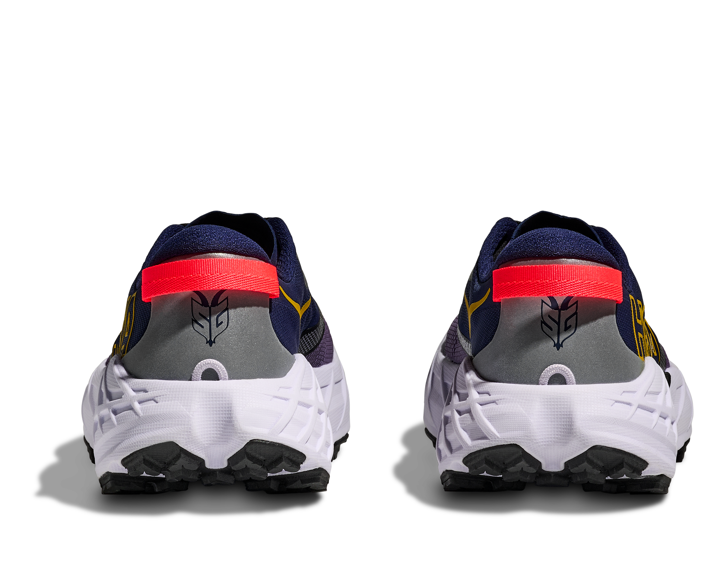 Pair of running shoes shown from the back on a white background