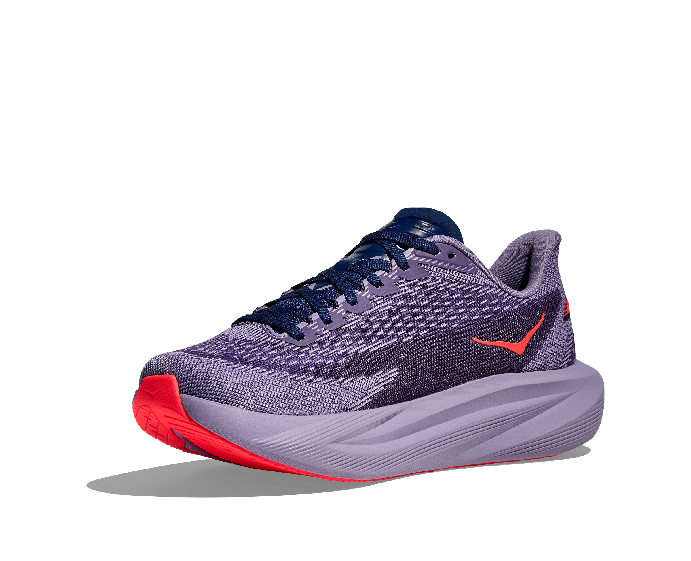 Purple running shoe with red sole on a white background