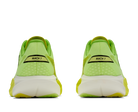 Green running shoes with 'MACH 7' branding on a white background