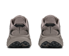 Pair of gray sneakers with black soles on a white background