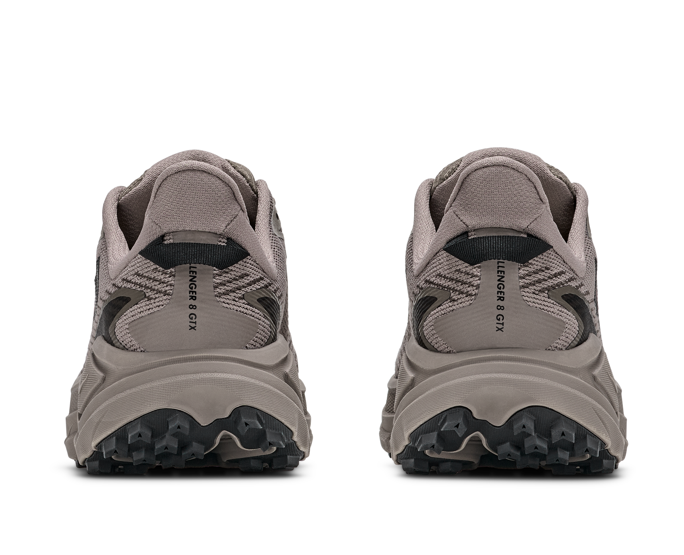 Pair of gray sneakers with black soles on a white background