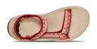 Beige sandal with red and blue strap on a white background