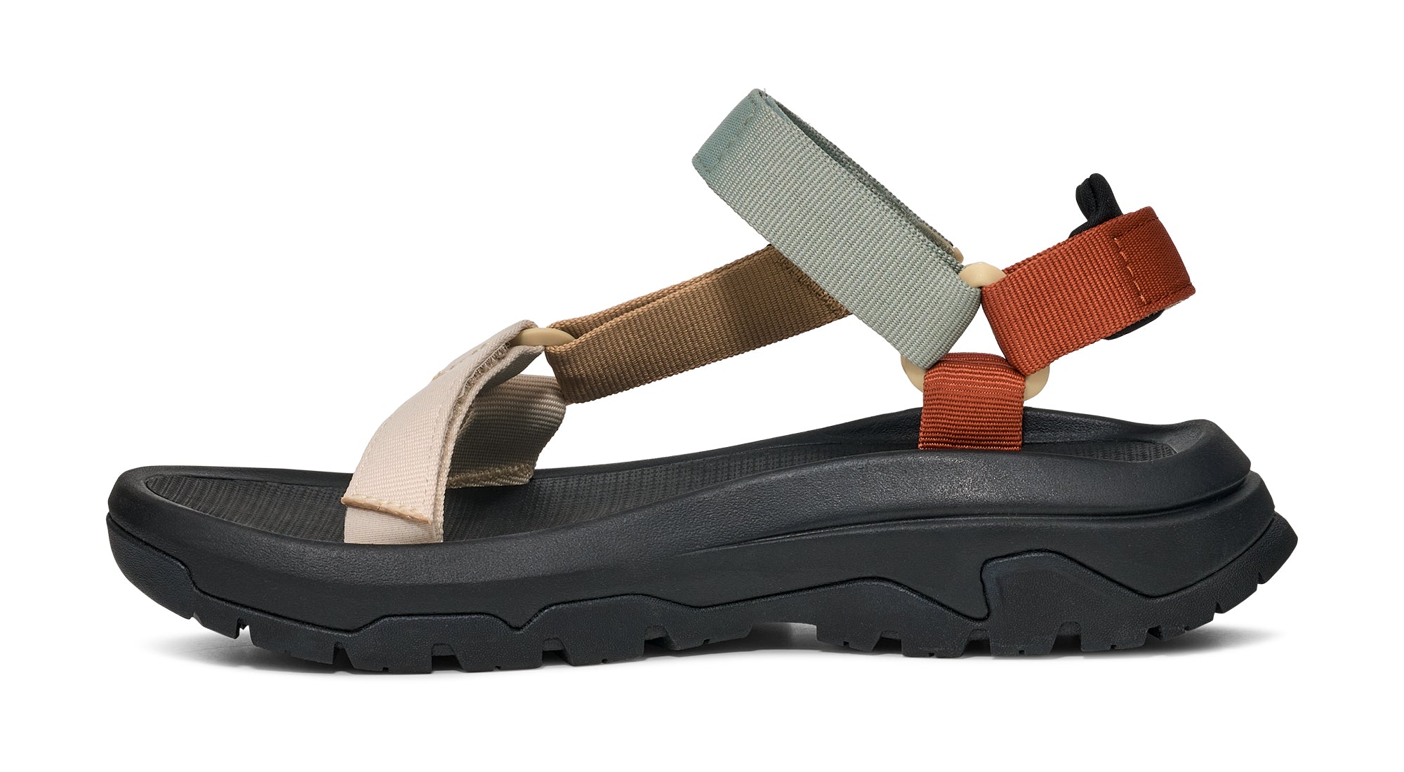 Multicolored sandal with a black sole on a white background