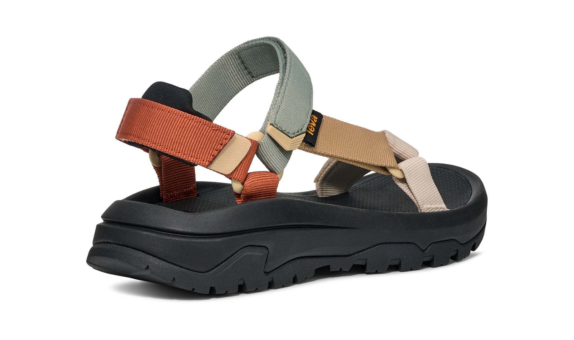 Multicolored sandal with a black sole on a white background