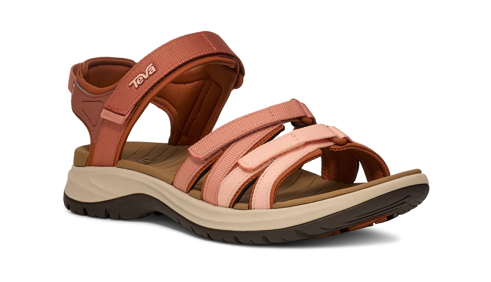Pair of Teva sandals in brown and pink on a white background