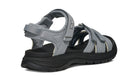 Gray sandal with black sole on a white background
