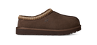 A single brown suede slipper with a textured brown and beige knit trim around the collar, shown in profile against a white background.