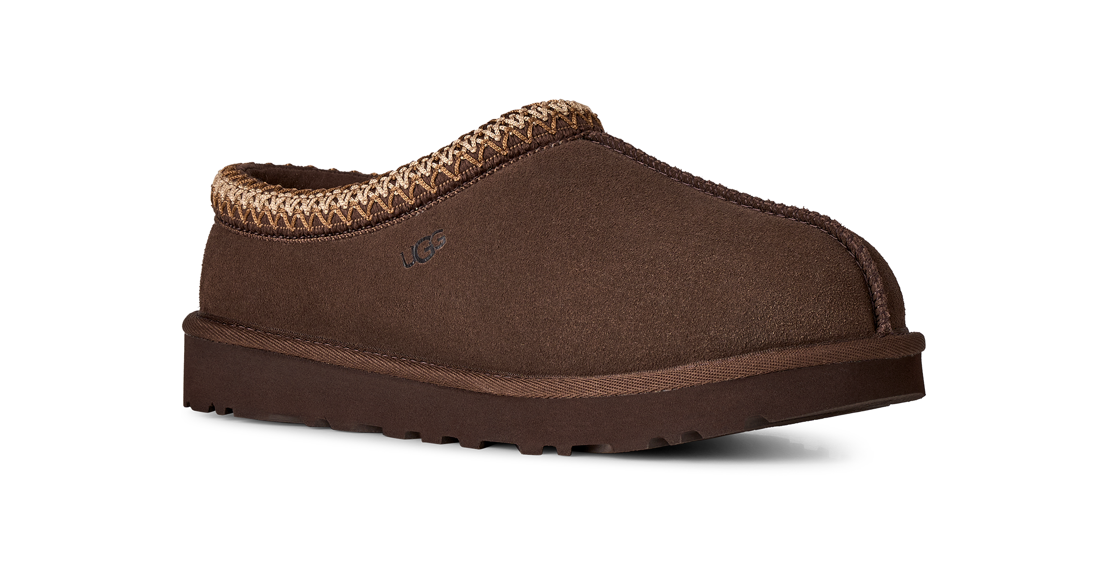 A single brown suede slipper with a braided tan trim around the collar and a thick brown sole, shown from a side profile on a white background.