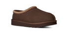 A single brown suede slipper with a braided tan trim around the collar and a thick brown sole, shown from a side profile on a white background.